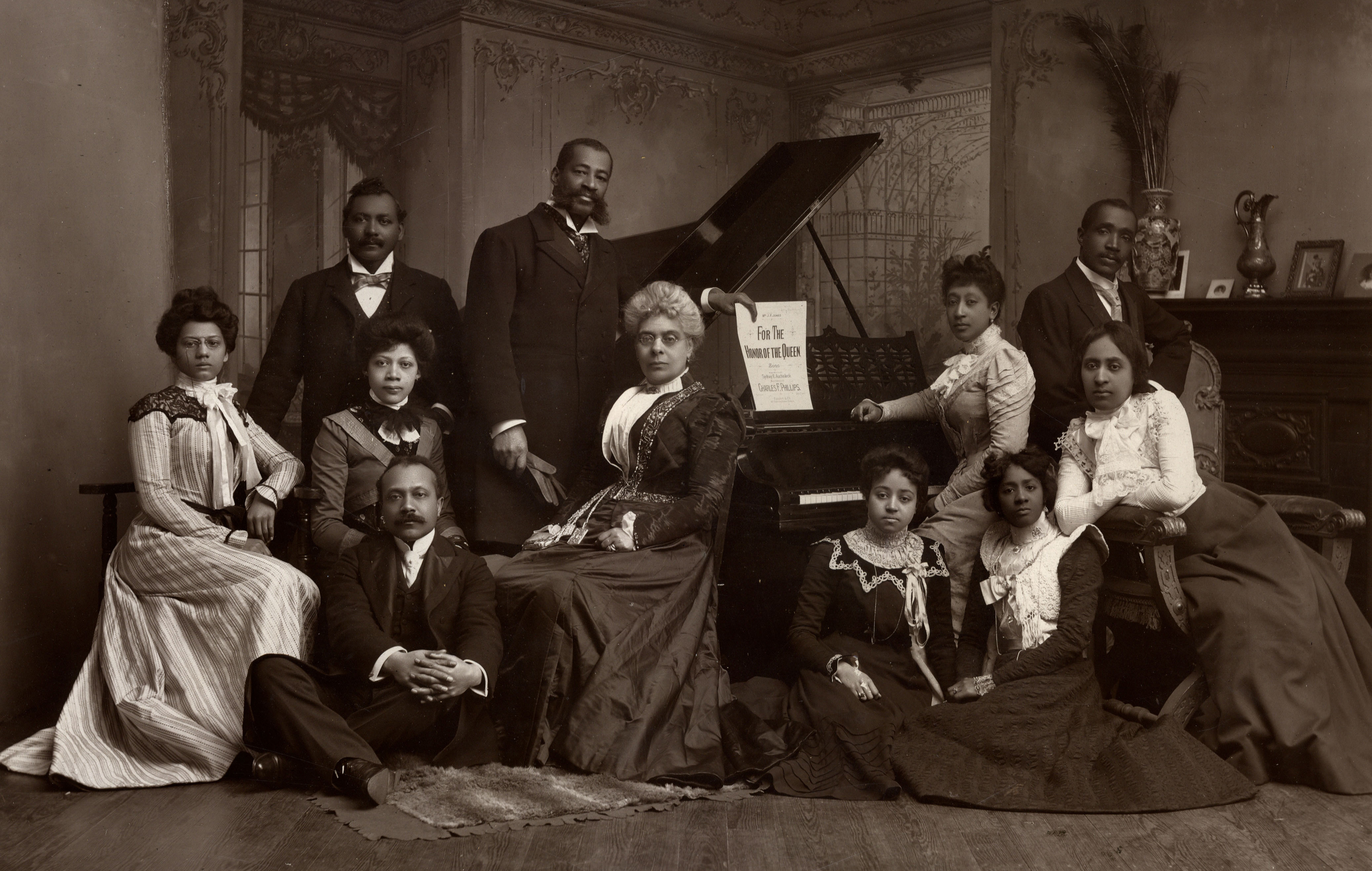 African American musicians around a piano